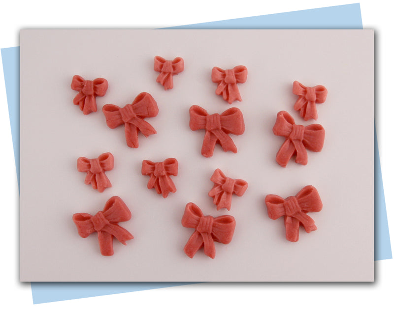 Soap embeds bows in red/pink