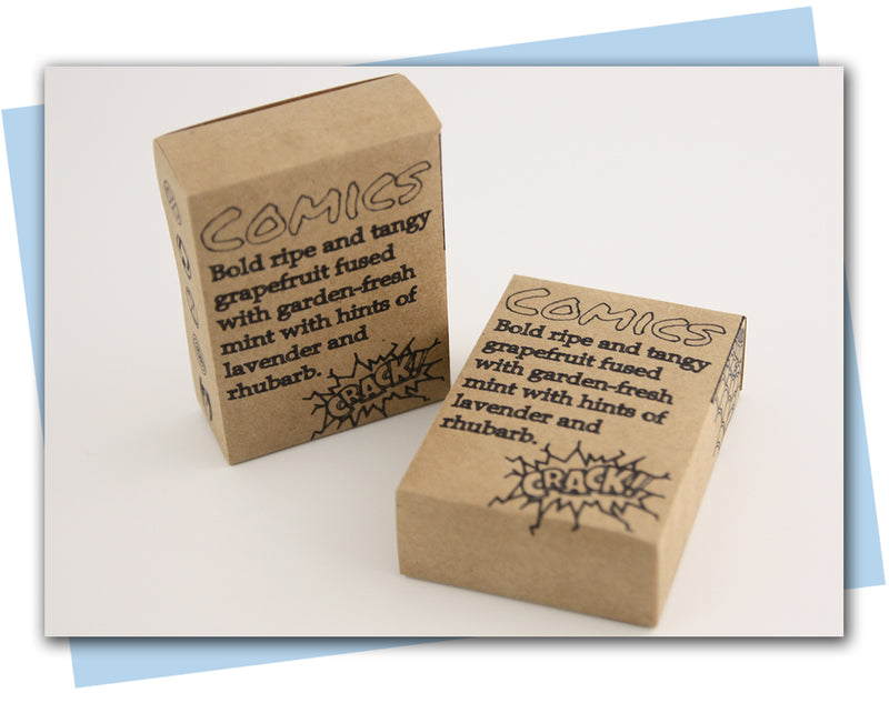 Two cardboard boxes labeled 'Mystery' with descriptive text on a light background.