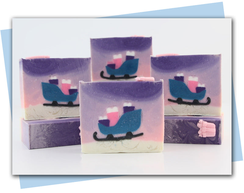 Set of soap bars with sleigh design on a white background