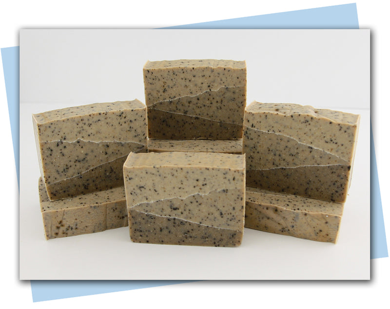 bars of soap in varying shades of brown with coffee grinds
