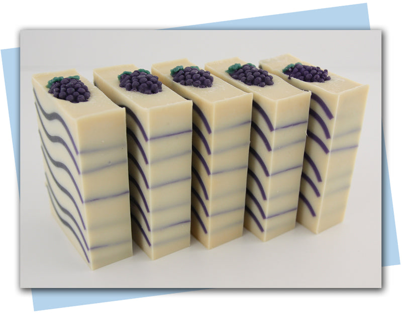 purple ombre waves in the soap with grape embeds on top