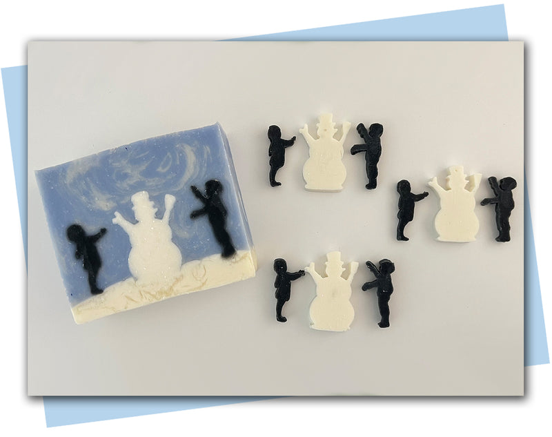 A girl and a boy building a snow man extruder disc set