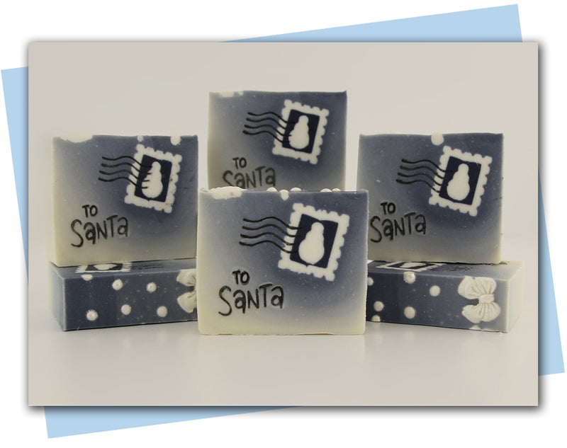 postage stamp with a snowman and to santa stamp white to blue ombre soap