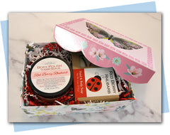 gift set in spring themed gift box with a soap and sugar scrub