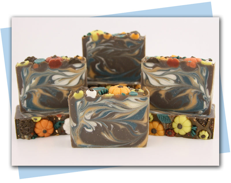 pumpkin soap with fall shapes on top and swirl inside