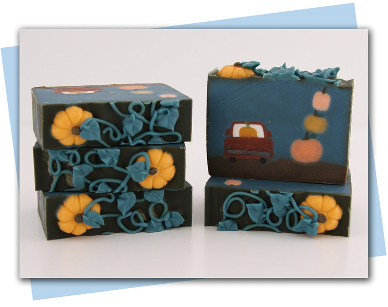 Soap with a car carrying pumpkin and pumpkin top decorations