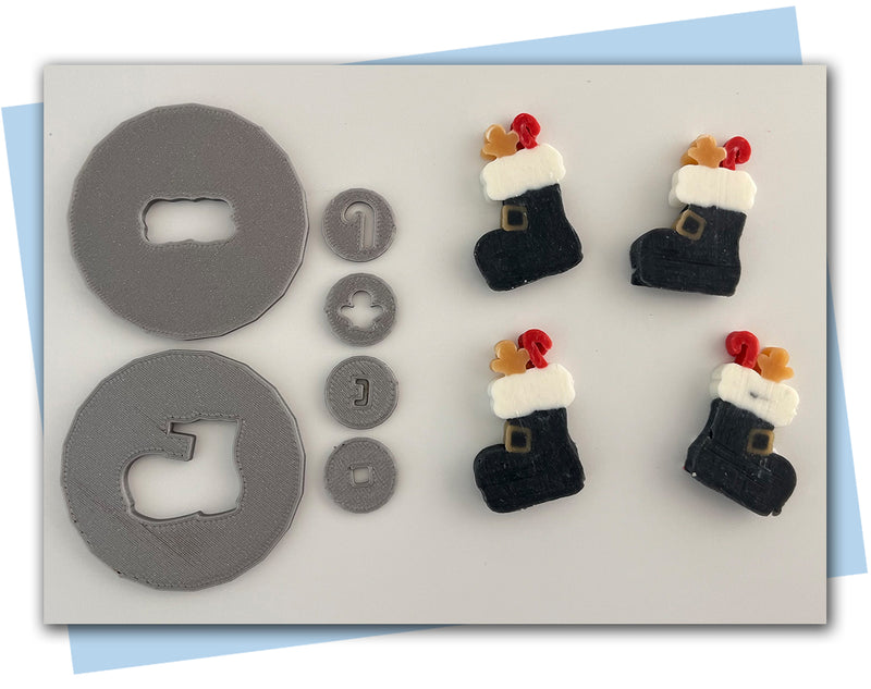 Santa boot with candy cane and gingerbread extruder discs and present extruder discs