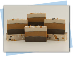 three layer design brown gold and white with soap pearls on top
