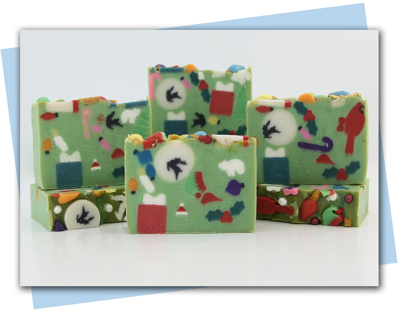 Holiday confetti soap with all different holiday shape embeds in the bars of soap