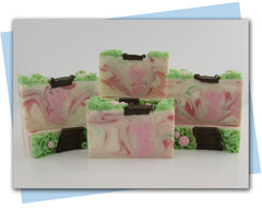 bars of soap with a path and flowers and grass