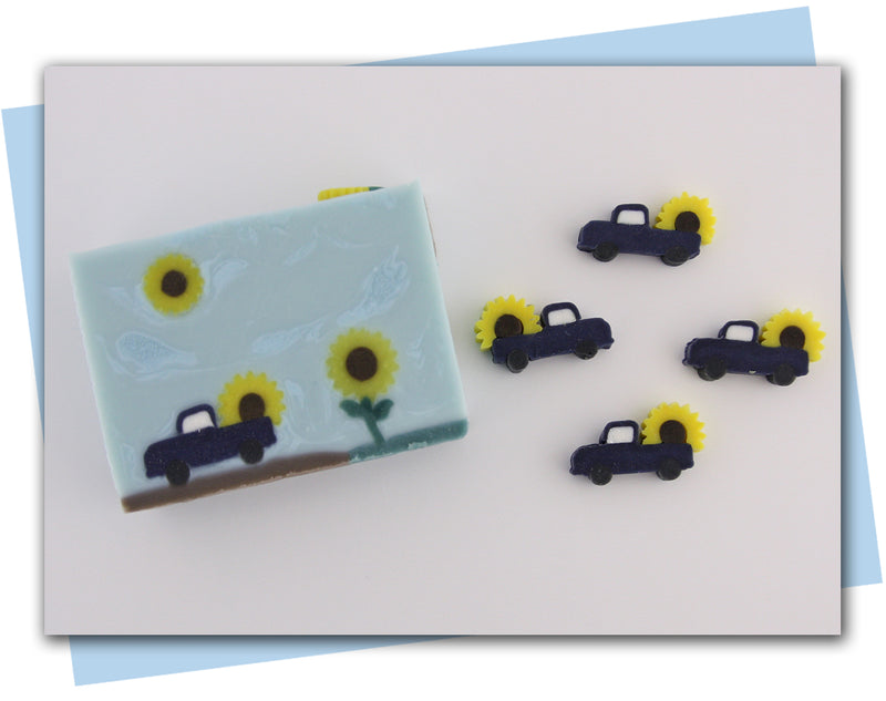 Truck with sunflower and lemon extruder disc embeds