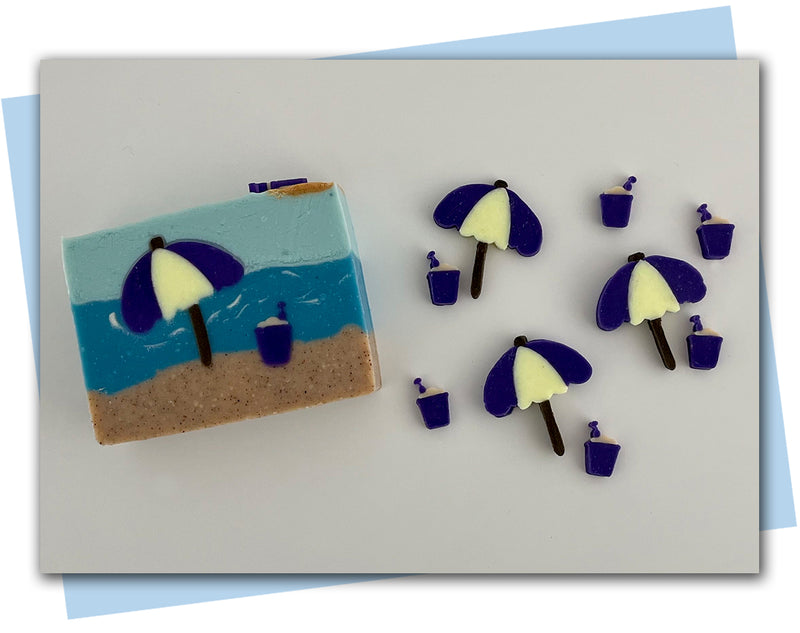 Beach umbrella and pail summer extruder discs