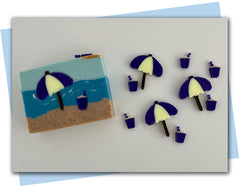 Beach umbrella and pail summer extruder discs