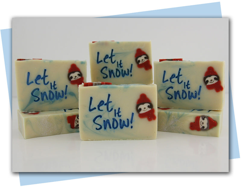 Sloth face in a scarf and hat with let it snow stamp bar soap