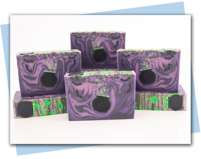 Purple soap with black swirls and a witch's cauldron