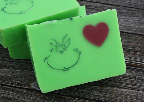 Green bar of soap with heart in corner
